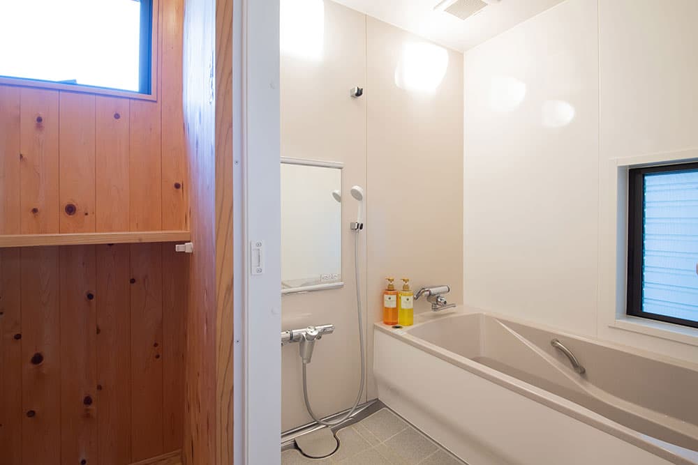 SHARED BATHROOM AND SHOWER BOOTH
